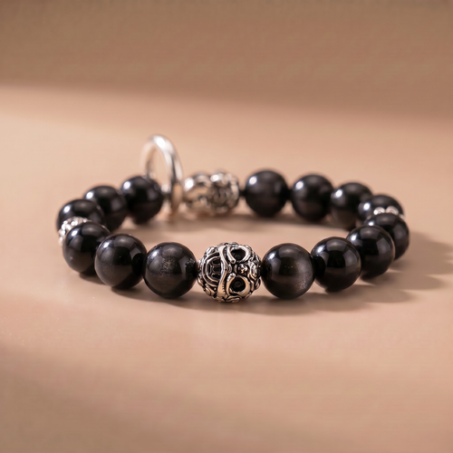 A deep-toned bracelet inspired by calmness, wisdom, and inner steadiness.